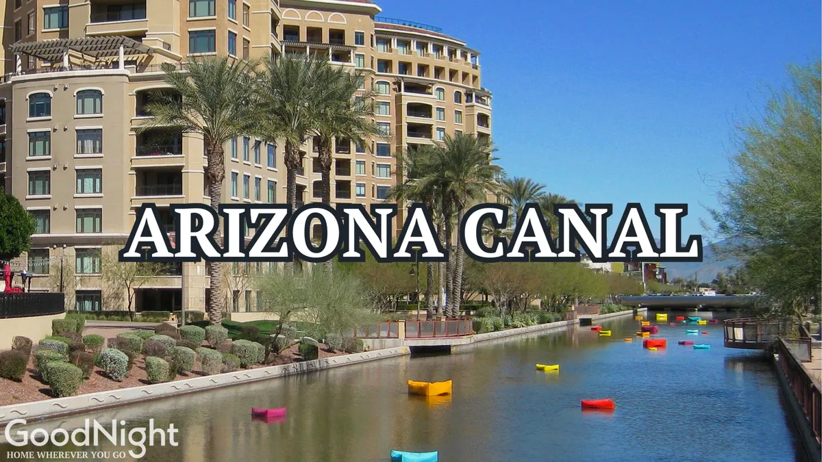 A lively scene along the Arizona Canal features colorful kayaks lined up by the water, palm trees swaying, and luxury buildings in the background. Walkers and boaters animate the area, while the sunny weather underscores the recreational opportunities available just minutes away from the property.